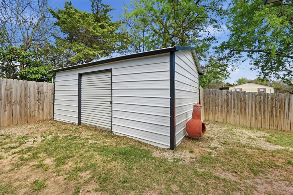 501 Bonham Street Tom Bean, TX 75491 - Photo 35 of 40 a backyard of a house