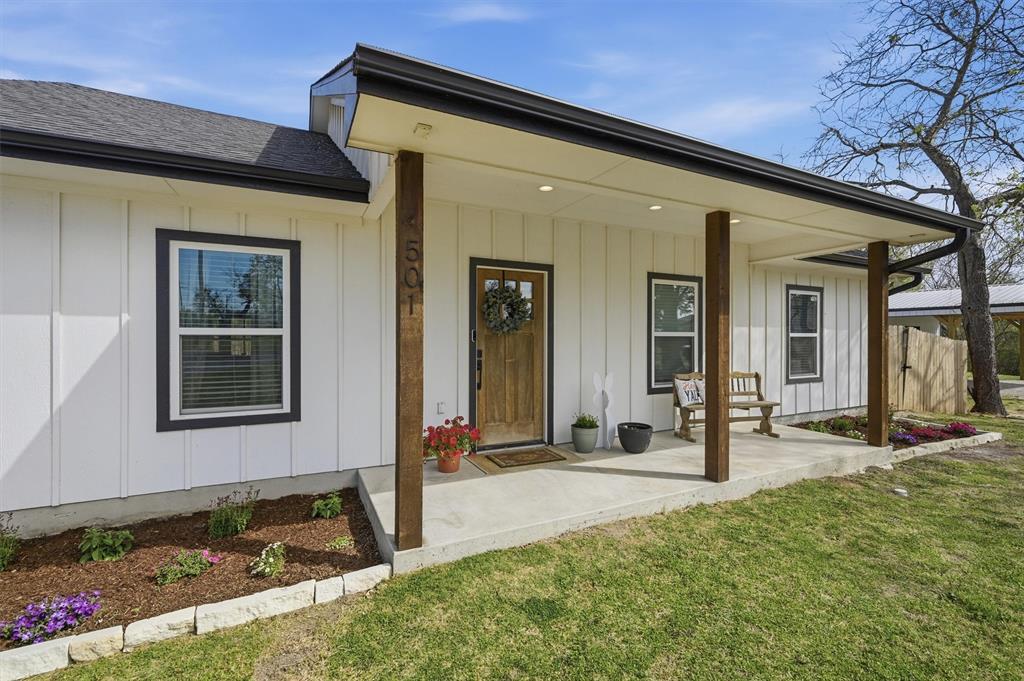 501 Bonham Street Tom Bean, TX 75491 - Photo 4 of 40 a front view of a house with a yard