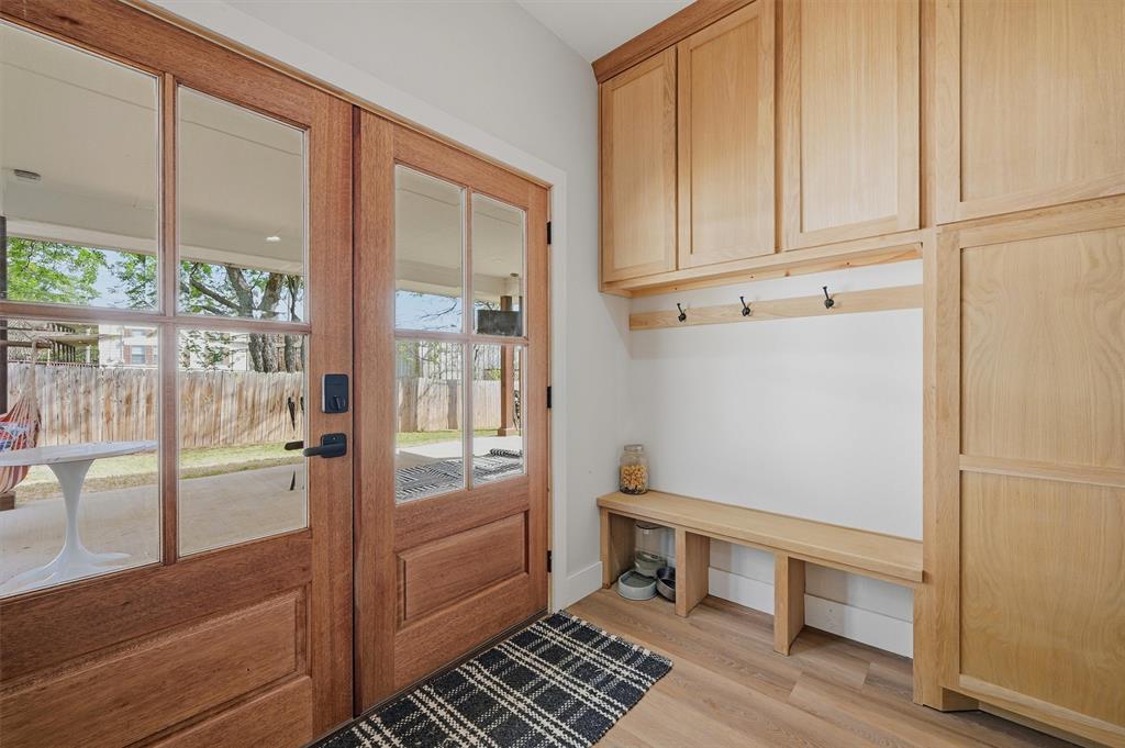 501 Bonham Street Tom Bean, TX 75491 - Photo 10 of 40 a room with wooden floor and furniture