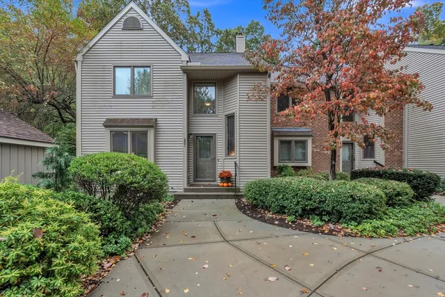 front view of a house with a small yard