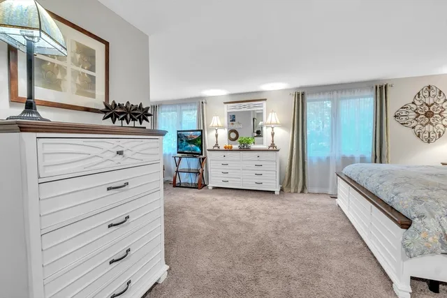 a view of room with cabinet and mirror