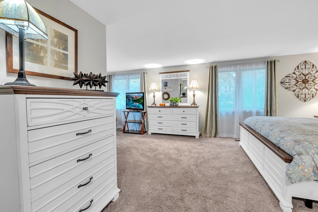 770 Salisbury Street, Unit 201 Worcester, MA 01609 - Photo 21 of 42 a view of room with cabinet and mirror