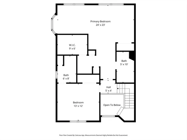 a picture of a bathroom with a shower