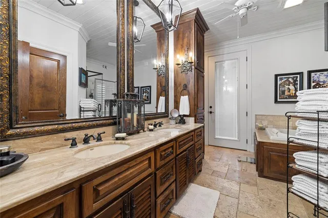 a bathroom with a bathtub and a shower