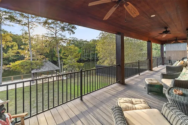 a view of a swimming pool and lounge chairs