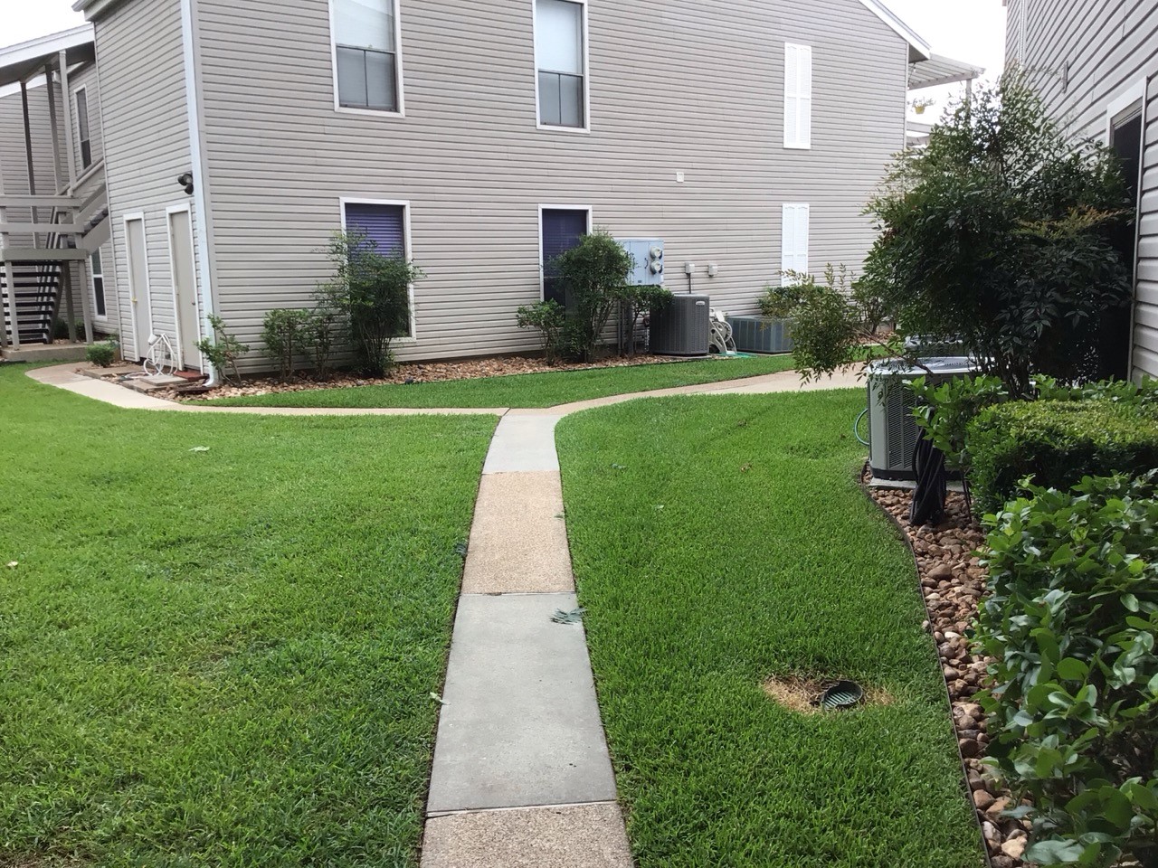 176 April Point Drive North Conroe, TX 77356 - Photo 3 of 17 a front view of a house with a yard