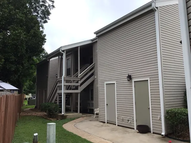 a front view of a house with garage