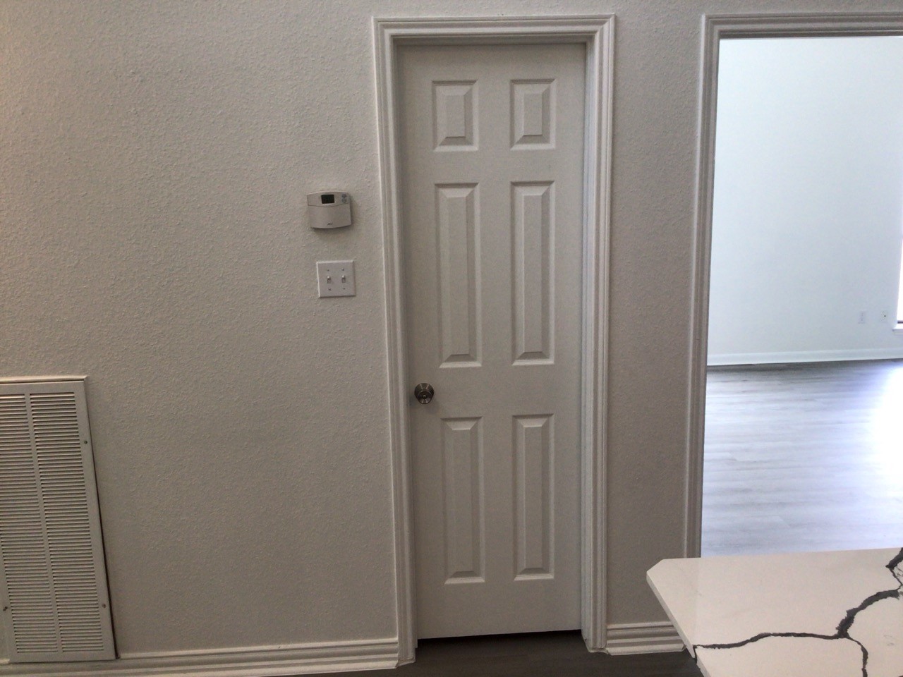 176 April Point Drive North Conroe, TX 77356 - Photo 10 of 17 a view of a hallway with wooden floor