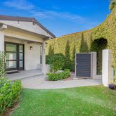 a view of a back yard of the house
