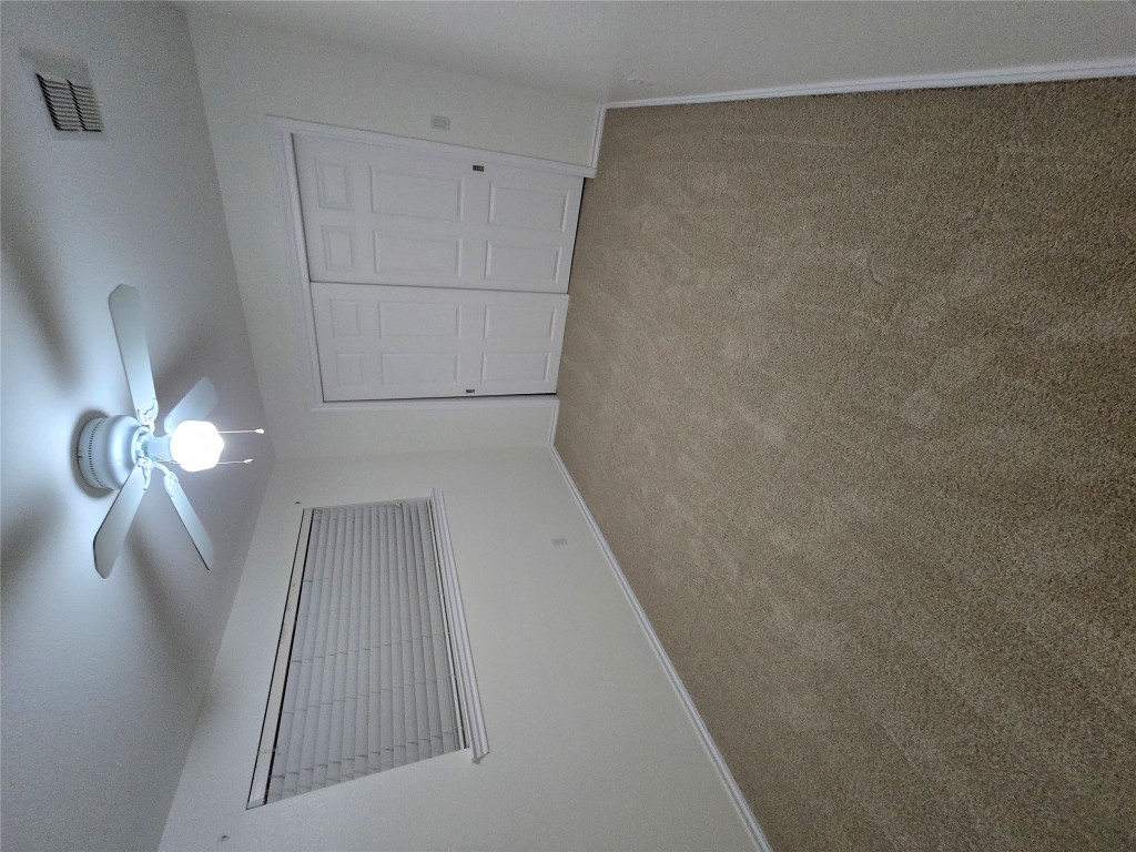 8511 Ephraim Road Austin, TX 78717 - Photo 12 of 14 a view of a big room with chandelier fan and windows