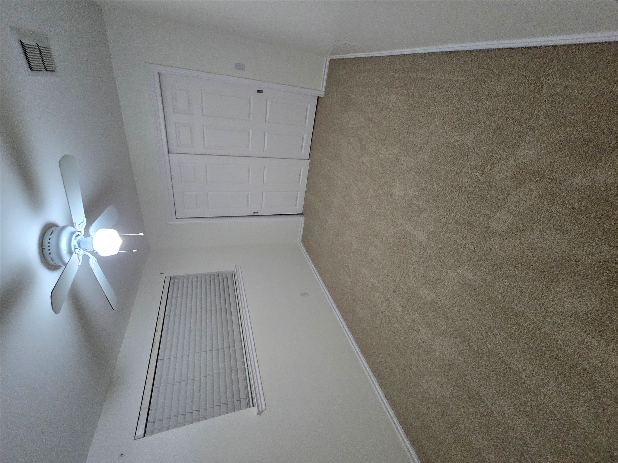 8511 Ephraim Road Austin, TX 78717 - Photo 12 of 14 a view of a big room with chandelier fan and windows