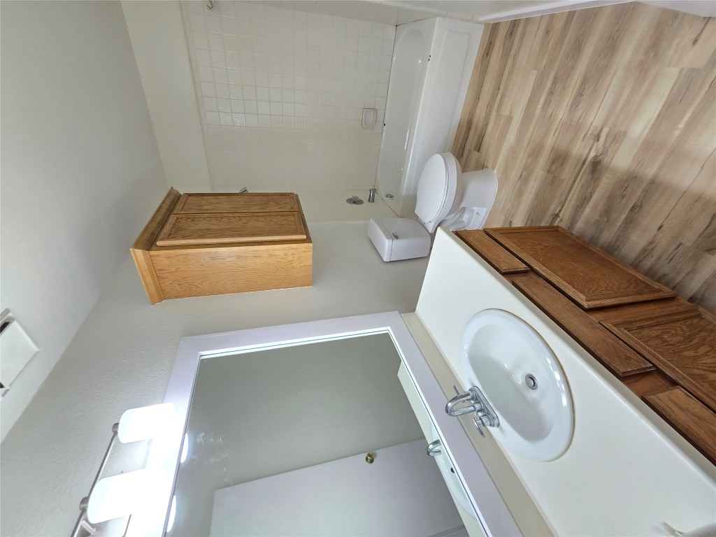 8511 Ephraim Road Austin, TX 78717 - Photo 10 of 14 a bathroom with a sink and a mirror