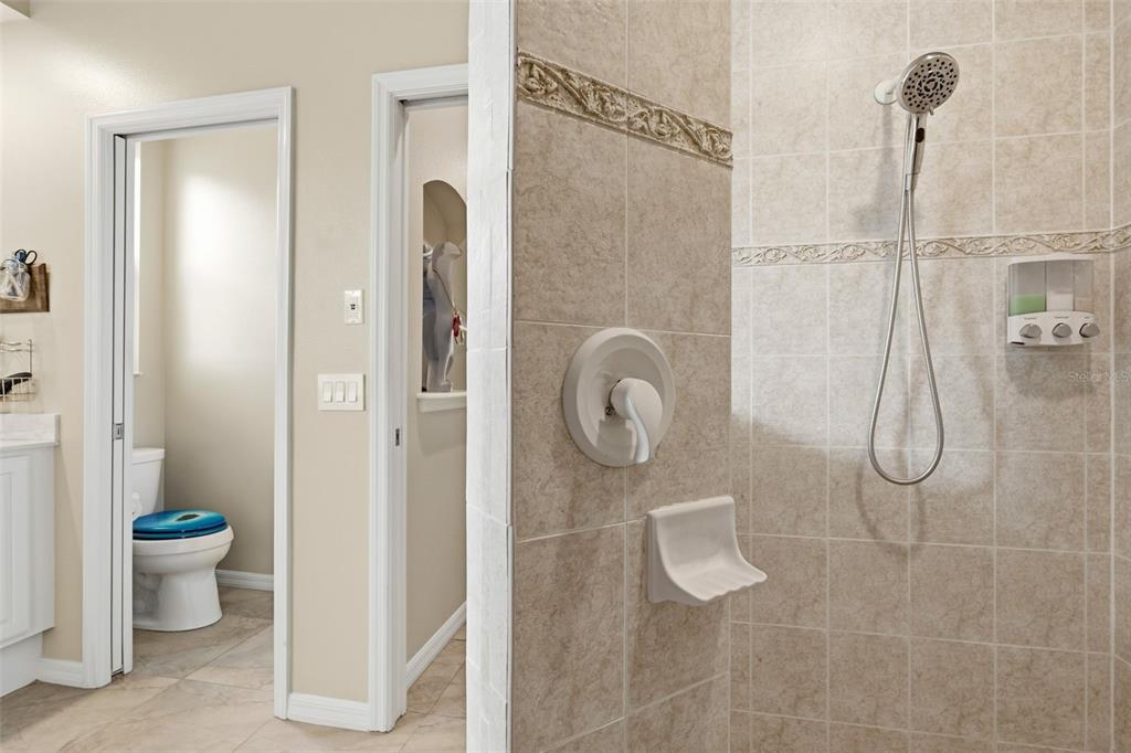 11808 Soft Rush Terrace Lakewood Ranch, FL 34202 - Photo 39 of 71 a bathroom with a shower