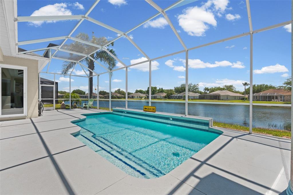 11808 Soft Rush Terrace Lakewood Ranch, FL 34202 - Photo 54 of 71 a view of a house with a yard