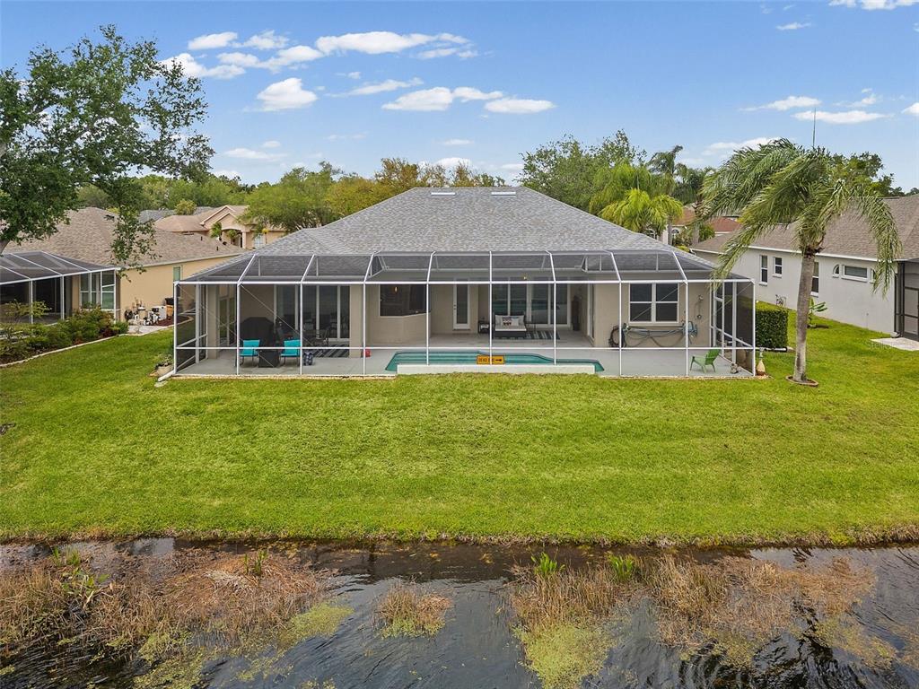 11808 Soft Rush Terrace Lakewood Ranch, FL 34202 - Photo 67 of 71 a front view of a house with garden