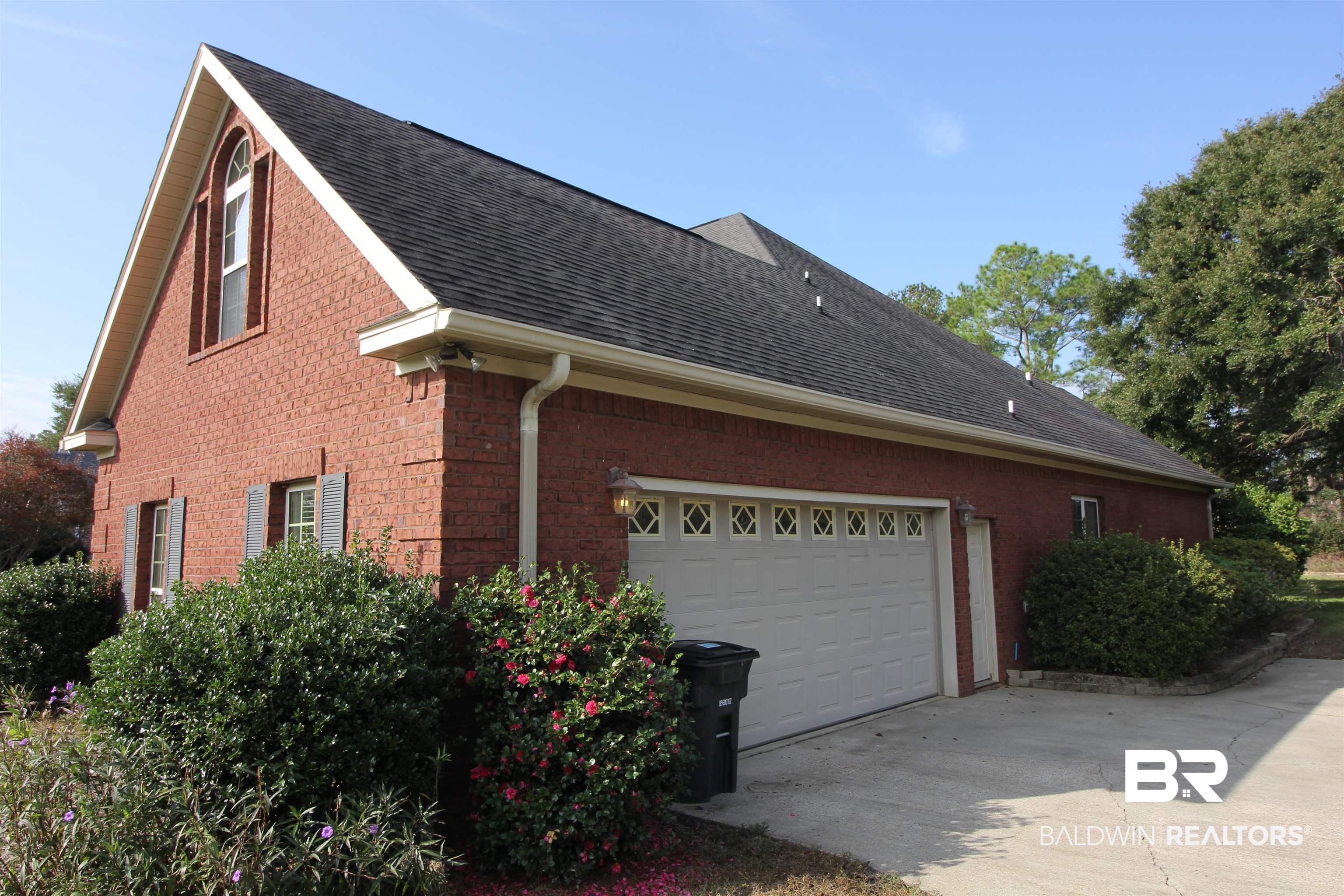 306 South Tee Drive Fairhope, AL 36532 - Photo 5 of 37 View of side of home with a garage