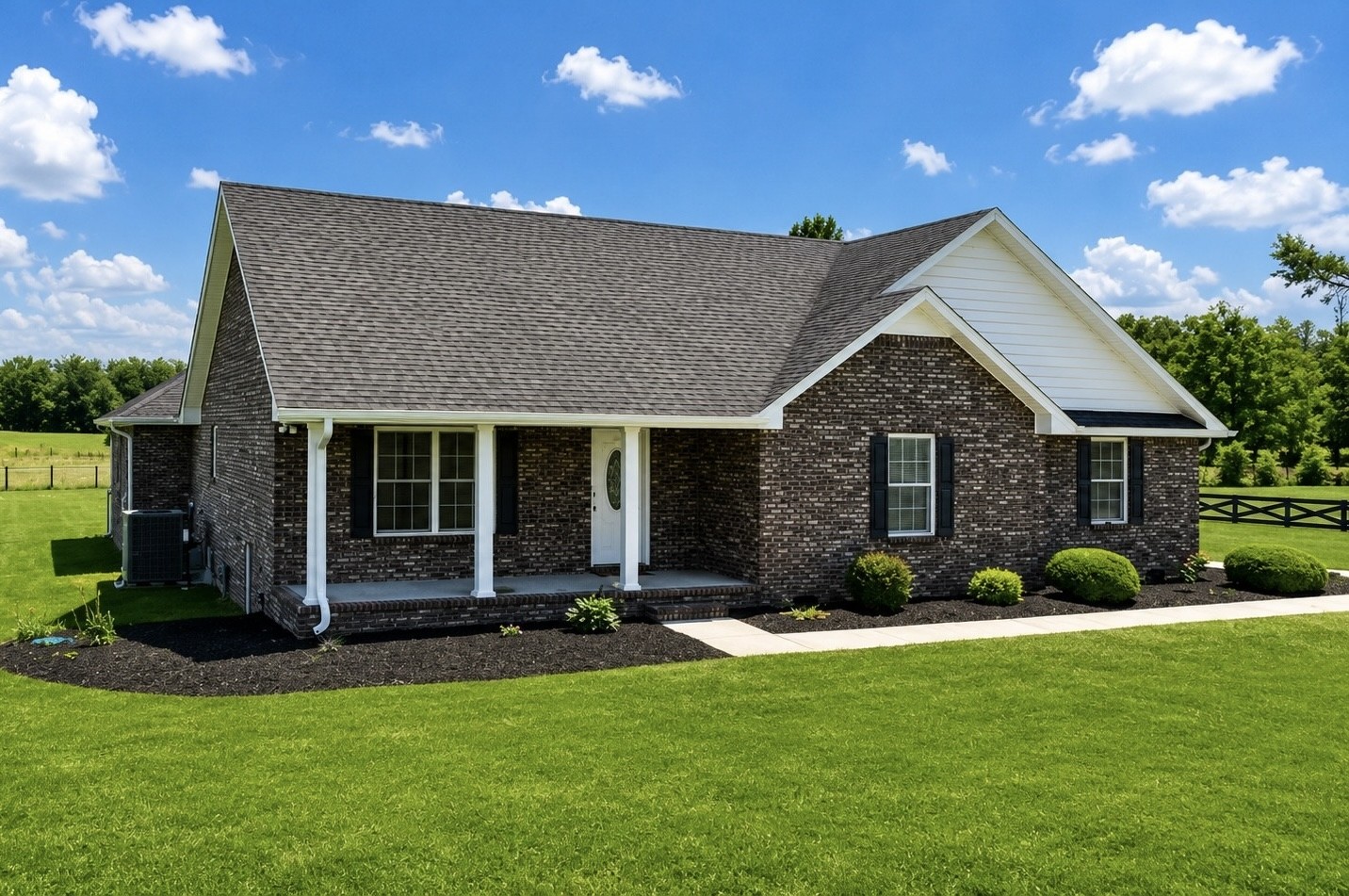 663 Jackson Road Portland, TN 37148 - Photo 1 of 32 a front view of a house with a yard