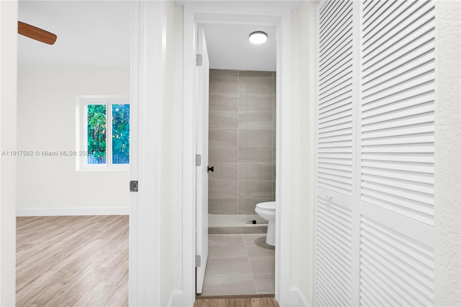 88 Southwest 29th Avenue Miami, FL 33135 - Photo 15 of 30 a bathroom with a toilet