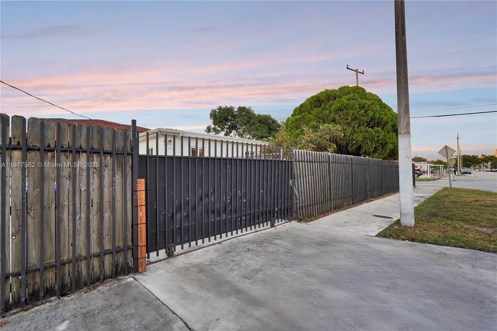 88 Southwest 29th Avenue Miami, FL 33135 - Photo 23 of 30 a view of a backyard with wooden fence