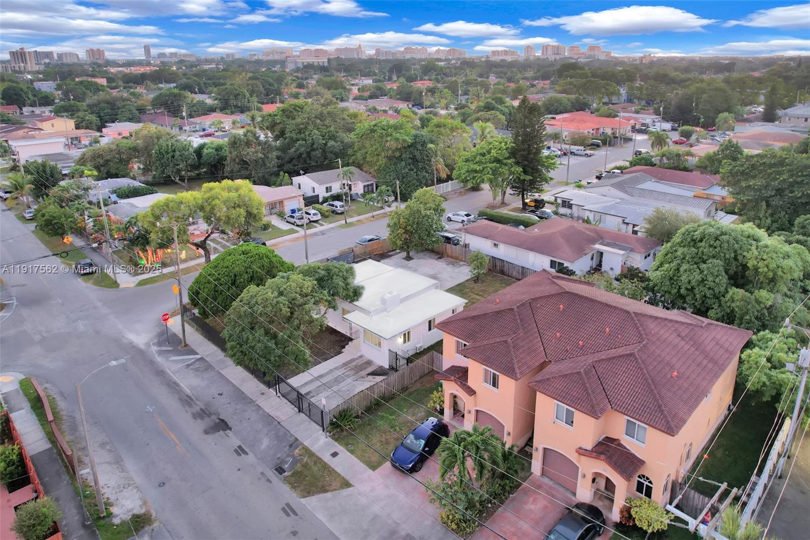 88 Southwest 29th Avenue Miami, FL 33135 - Photo 28 of 30 an aerial view of a houses with a street