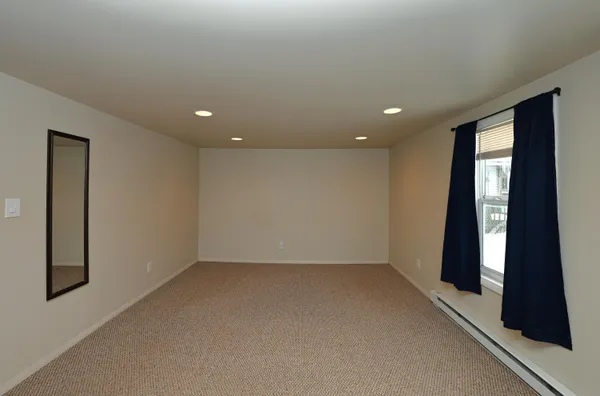 en empty room with windows