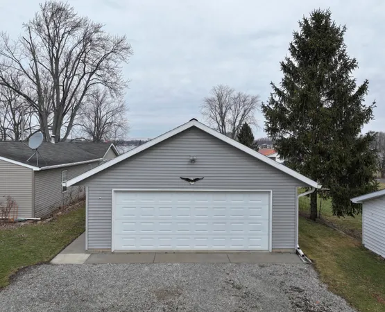 a small white house with a outdoor space