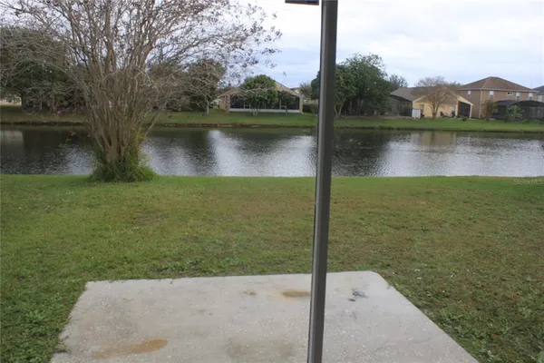 a view of a lake with a large park