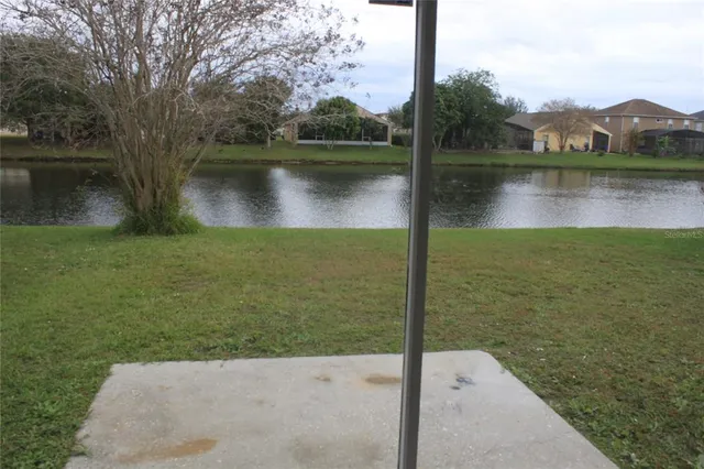 a view of a lake with a large park