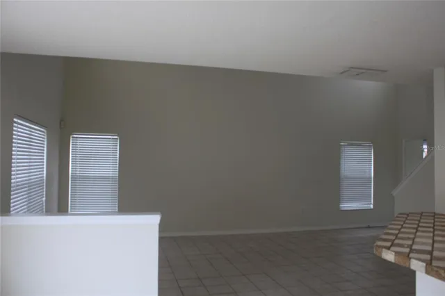 view of an empty room and window