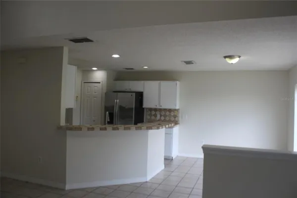 a view of a kitchen with a sink