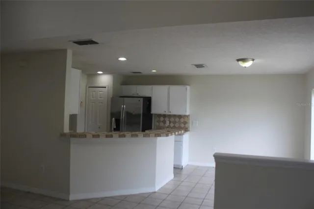 a view of a kitchen with a sink