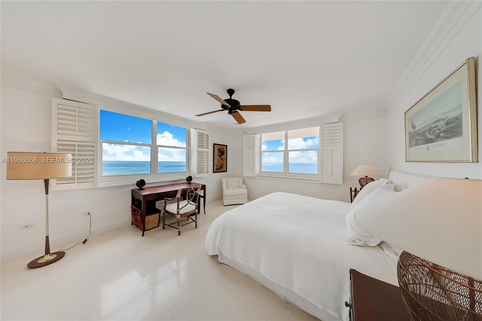 200 Ocean Ln Drive, Unit 1102 Key Biscayne, FL 33149 - Photo 12 of 24 a bedroom with a bed and a desk
