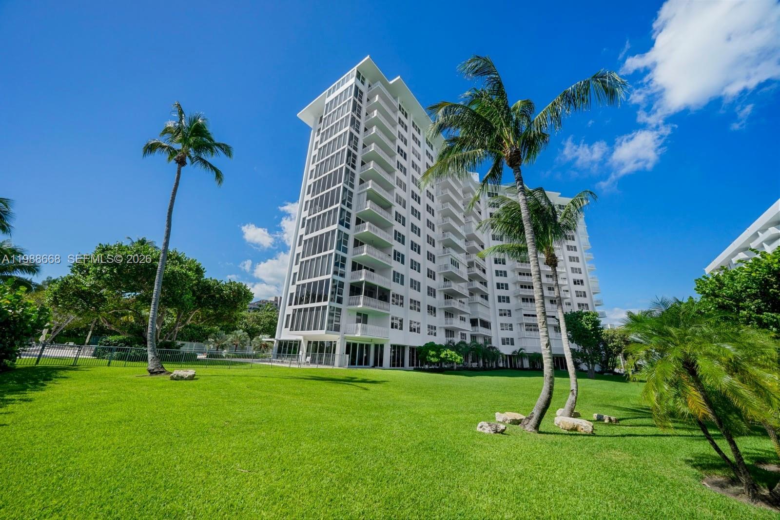 200 Ocean Ln Drive, Unit 1102 Key Biscayne, FL 33149 - Photo 24 of 24 a view of a yard with a house