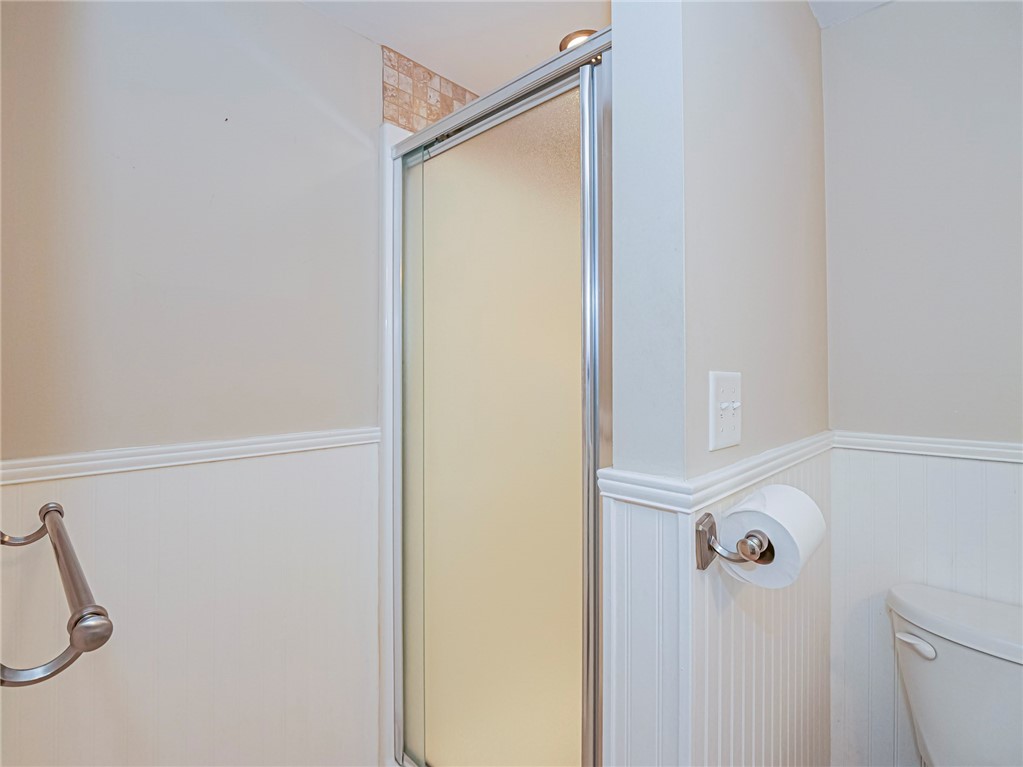 1860 Robalo Drive, Unit A105 Vero Beach, FL 32960 - Photo 16 of 35 a bathroom with a shower
