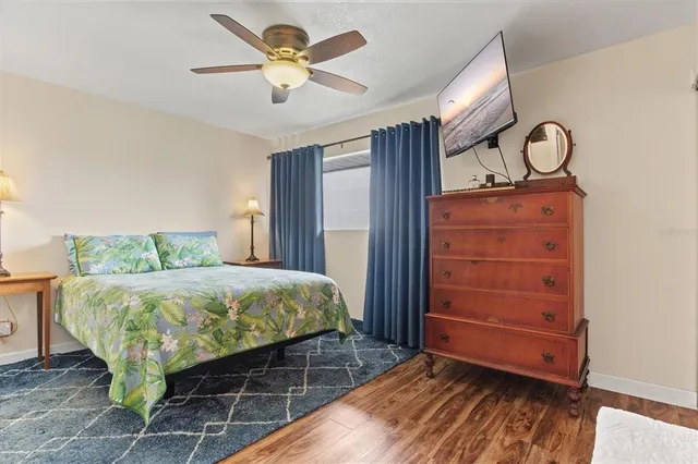 a bedroom with a bed and a walk in closet