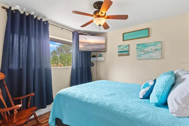 a bathroom with a sink toilet mirror and shower