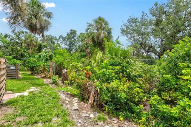 an aerial view of a house with a garden