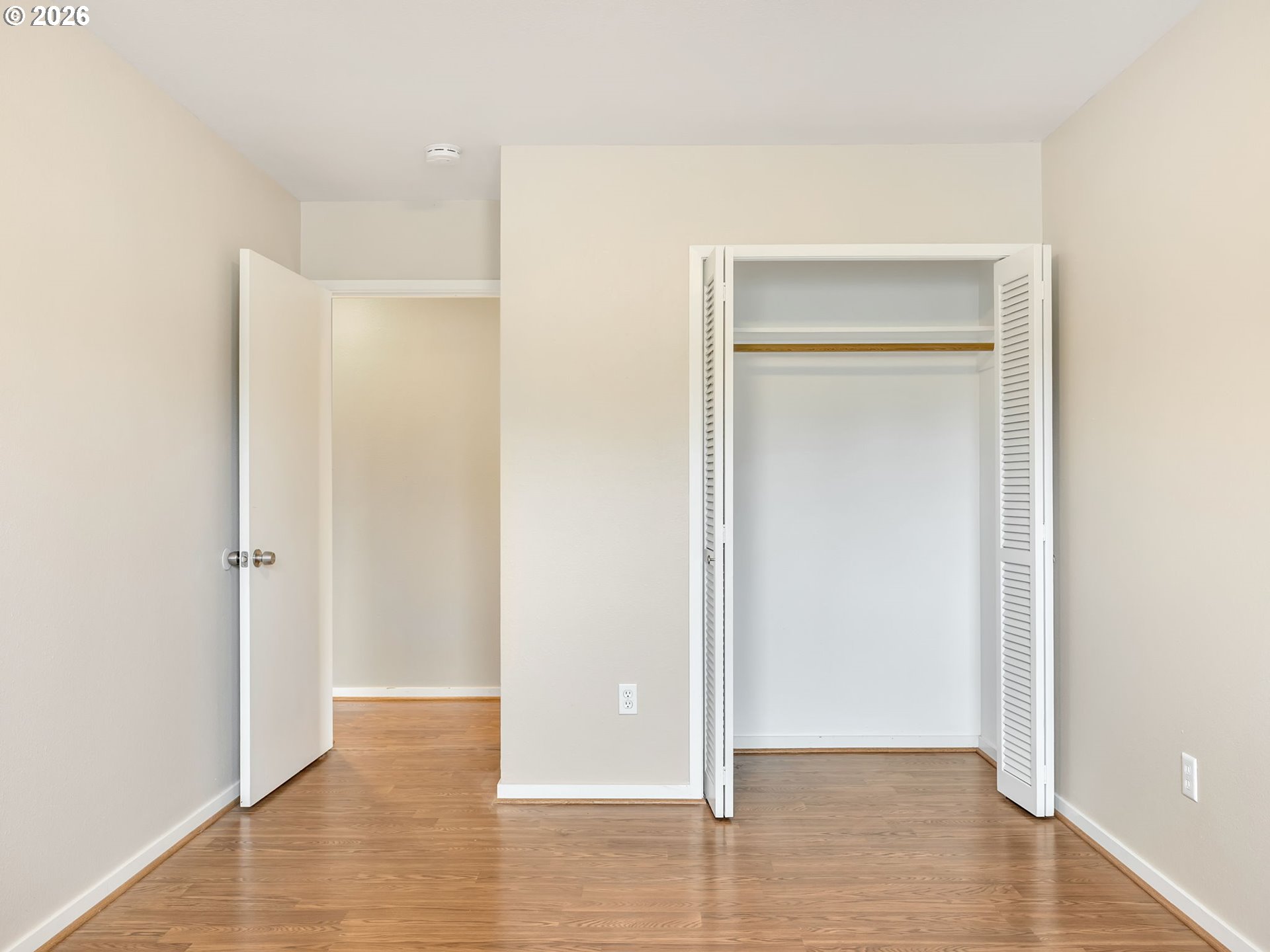 91923 Ridge Road Warrenton, OR 97146 - Photo 17 of 35 a view of an empty room with wooden floor