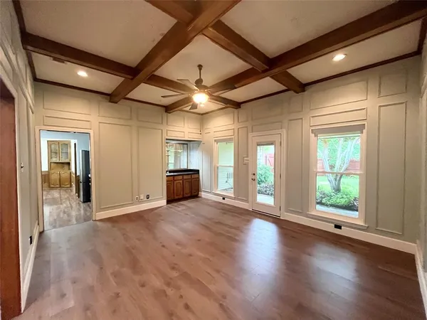a view of a livingroom with wooden floor
