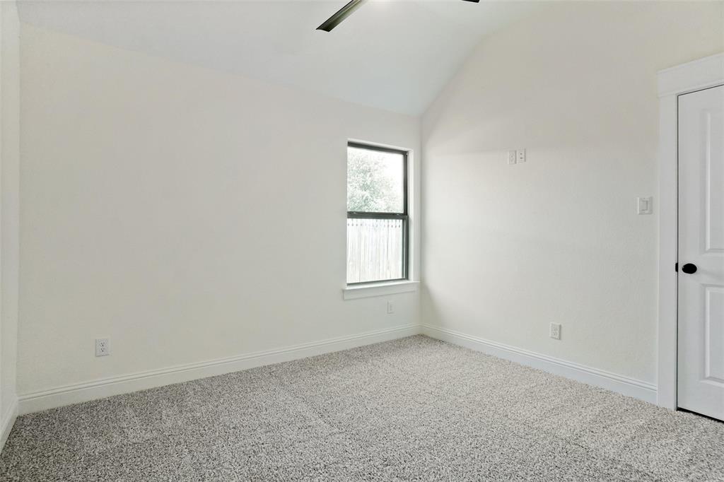 107 South 6th Street Godley, TX 76044 - Photo 16 of 21 an empty room with a window