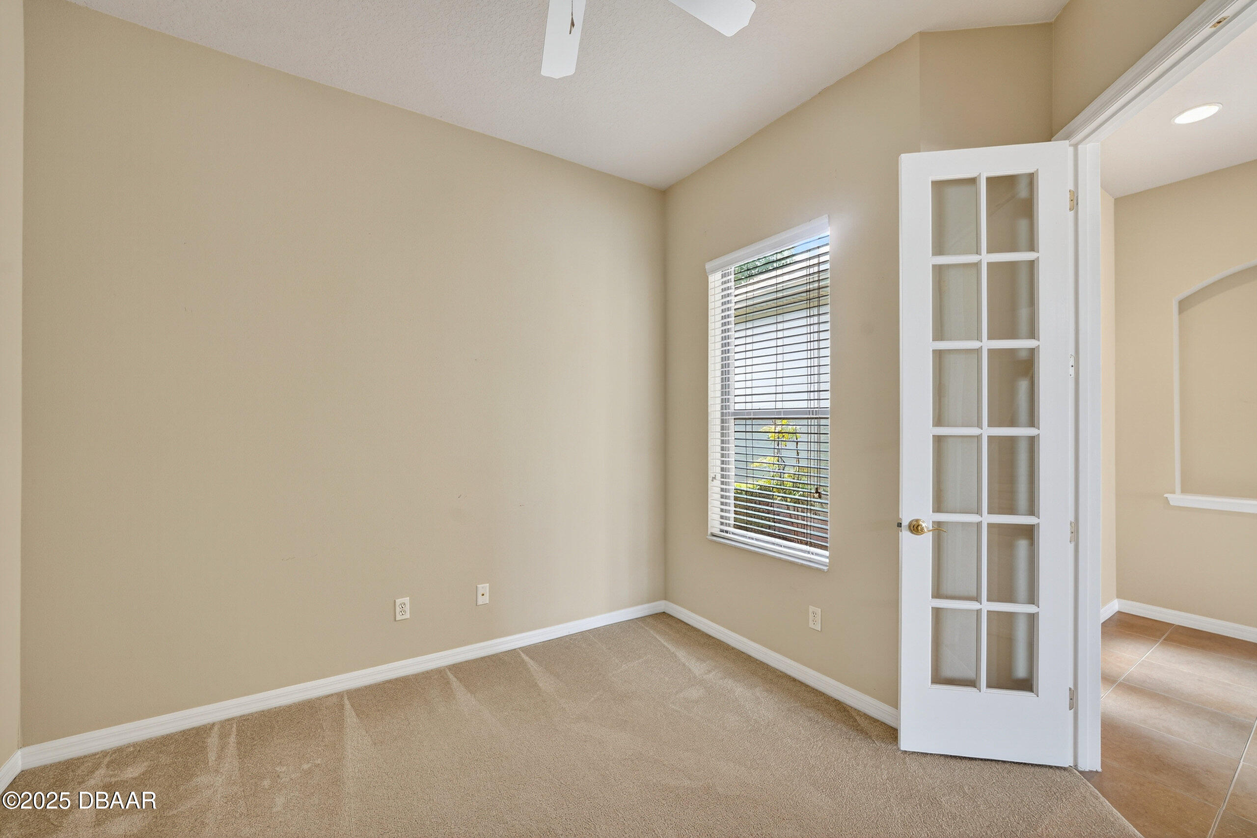 1312 Hansberry Lane Ormond Beach, FL 32174 - Photo 8 of 31 an empty room with windows