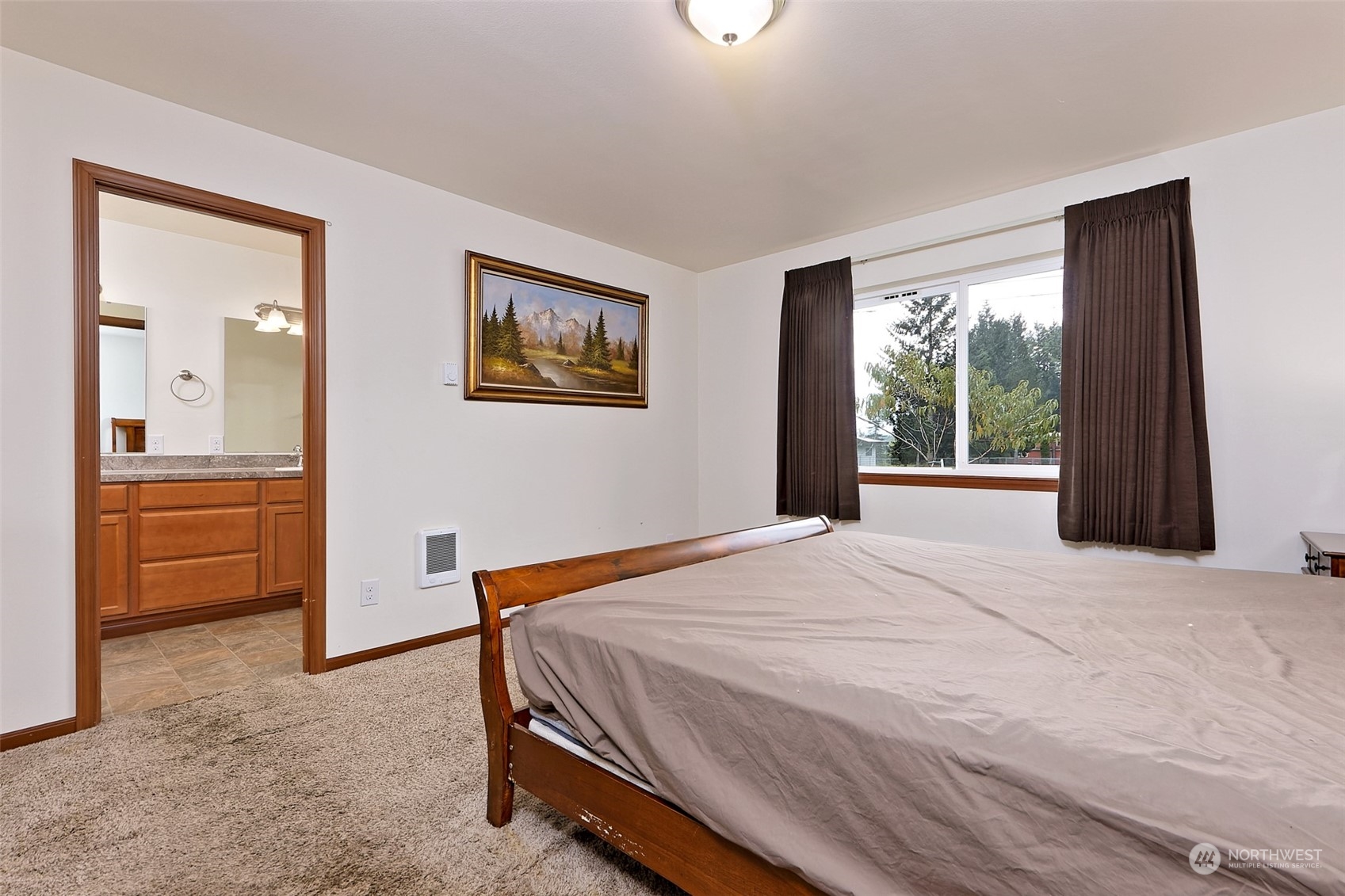 1025 Connection Street Shelton, WA 98584 - Photo 12 of 21 a bedroom with a bed and a view of kitchen