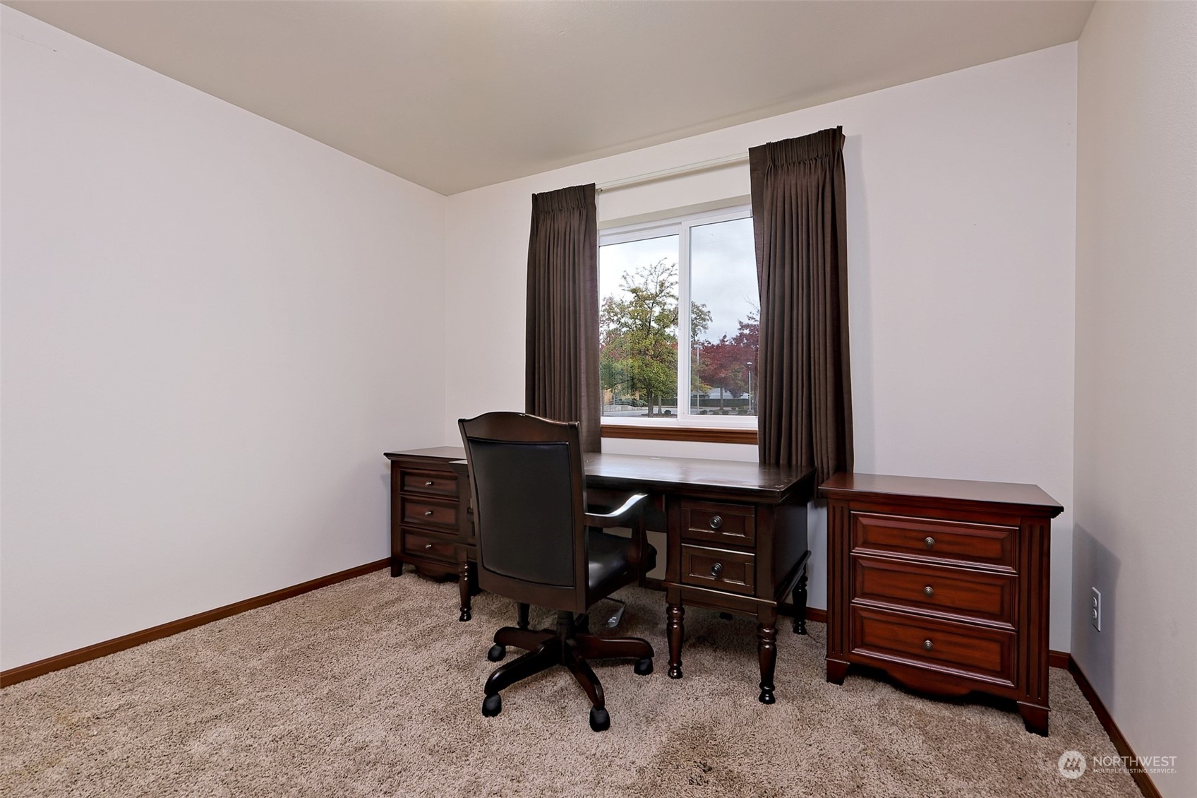1025 Connection Street Shelton, WA 98584 - Photo 18 of 21 a view of a workspace with furniture and a window