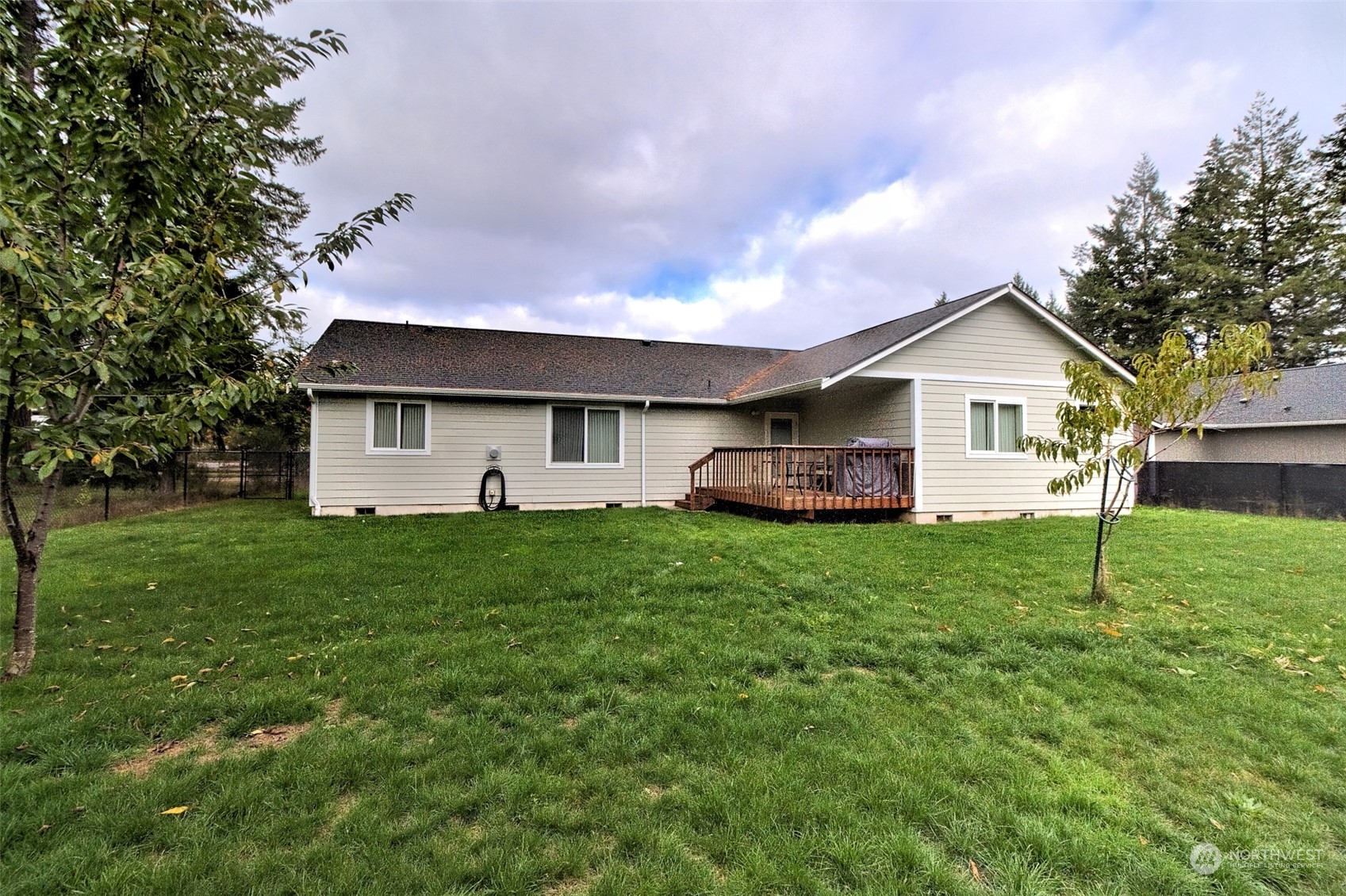 1025 Connection Street Shelton, WA 98584 - Photo 21 of 21 a view of a house with backyard and garden