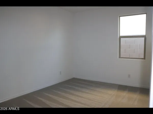 a view of empty room with window