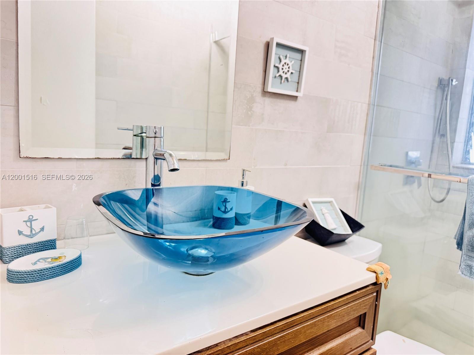 1340 Lincoln Road, Unit 805 Miami Beach, FL 33139 - Photo 13 of 21 a sink with a potted plant