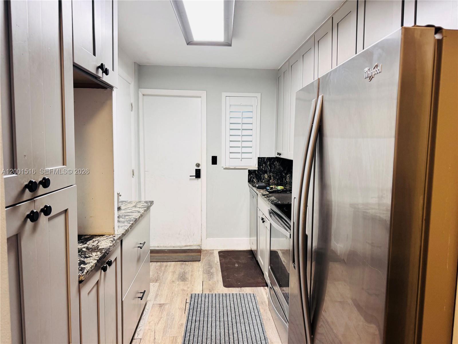 1340 Lincoln Road, Unit 805 Miami Beach, FL 33139 - Photo 5 of 21 a view of a kitchen from a windows