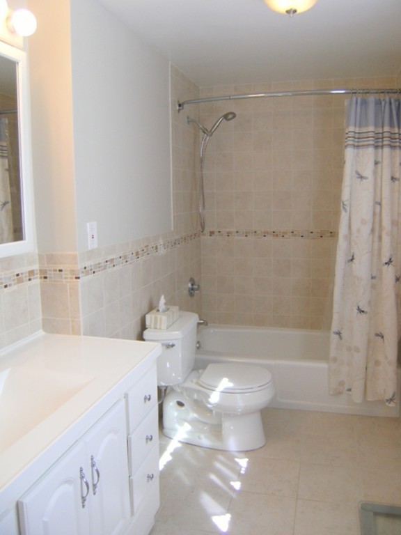 6 Gerald Road Framingham, MA 01701 - Photo 12 of 20 a bathroom with a sink a toilet and shower
