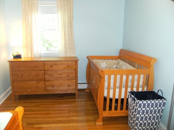 6 Gerald Road Framingham, MA 01701 - Photo 13 of 20 a bedroom with a bed and wooden floor