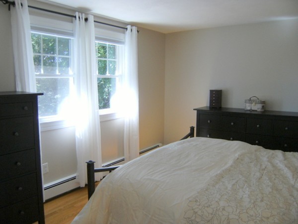 6 Gerald Road Framingham, MA 01701 - Photo 17 of 20 a bedroom with a bed and a window